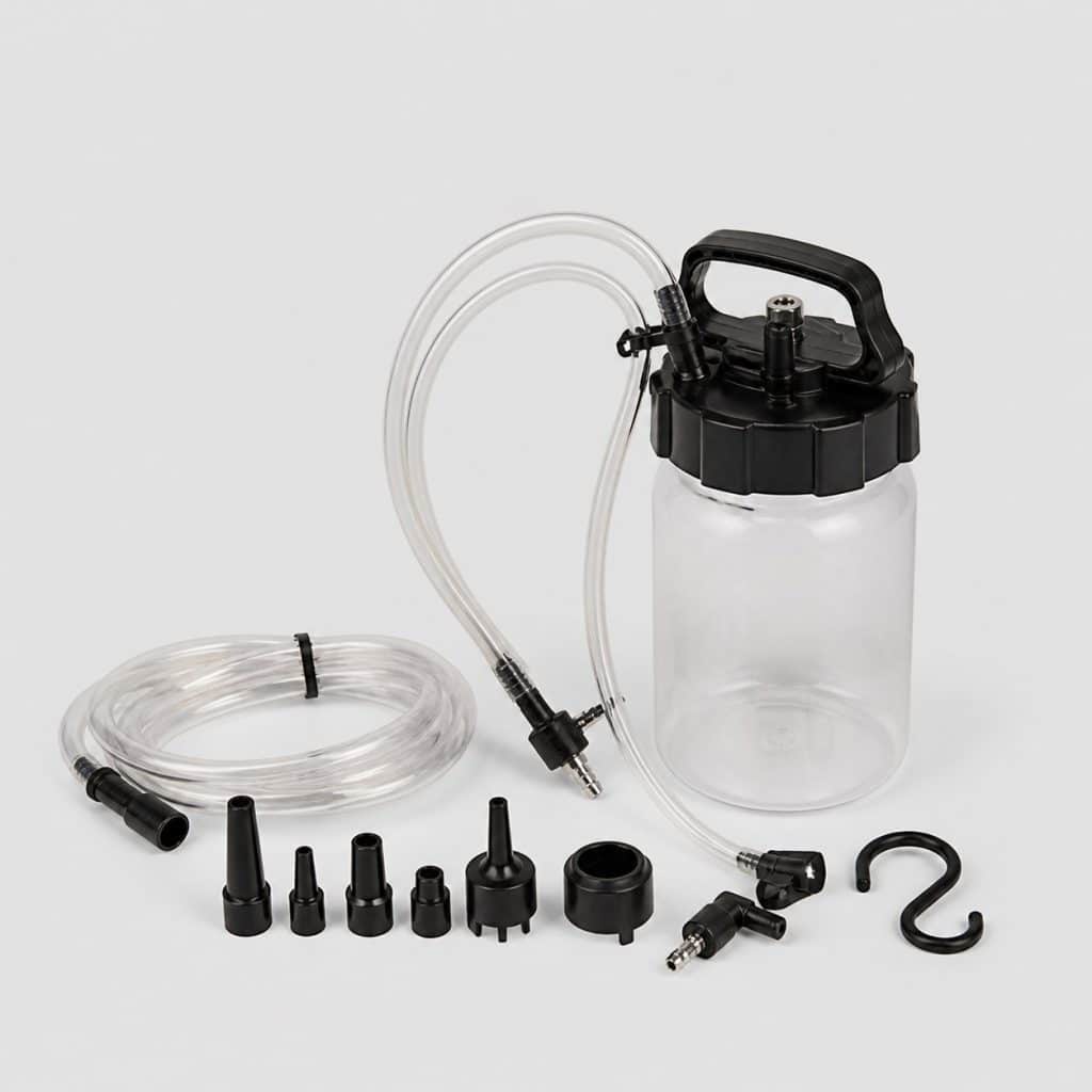 Kit de purge de frein complet avec bocal collecteur sur fond clair